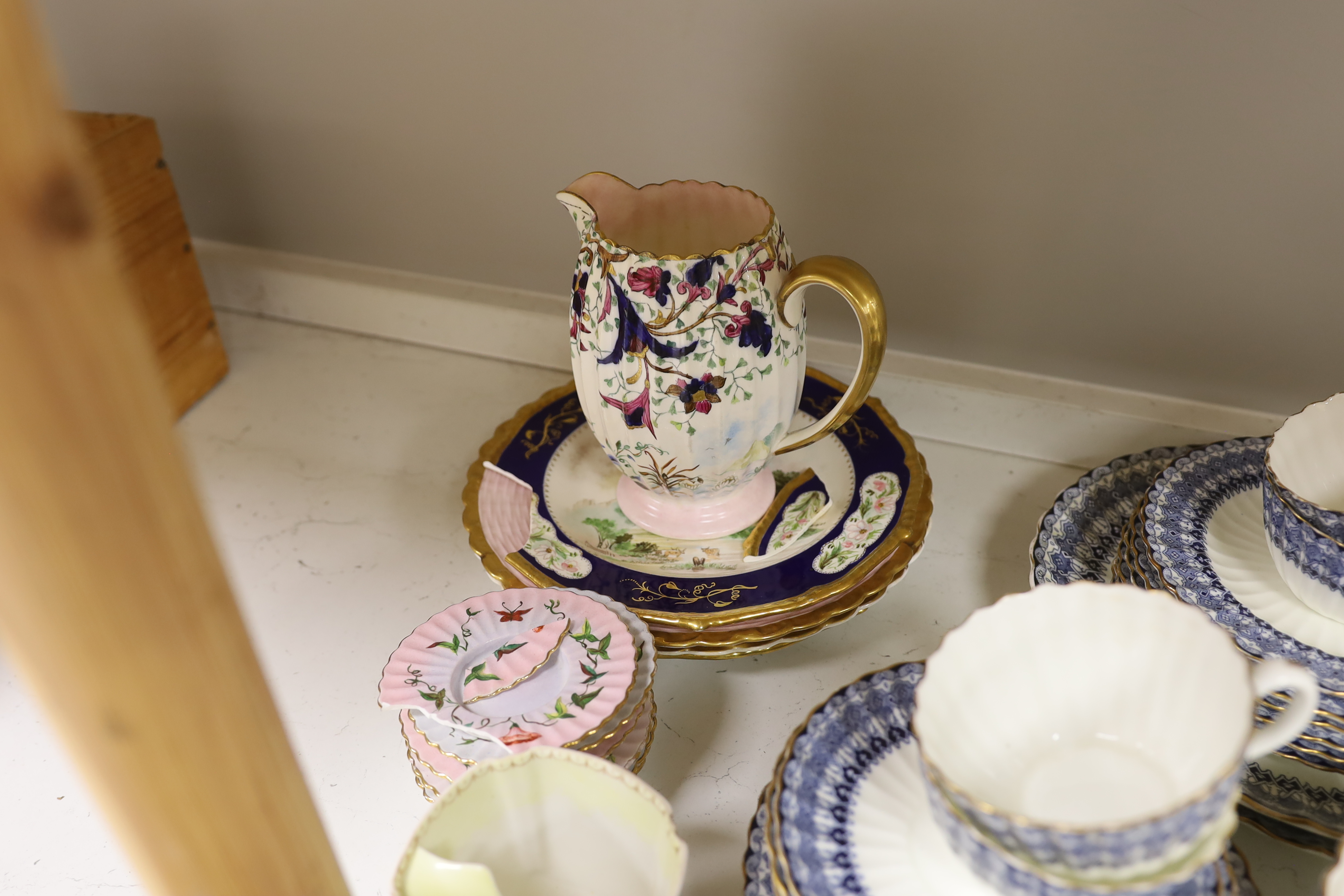 A Copeland Spode porcelain part tea set and two dishes, painted with scenes after Birkett Foster, a blue and white teaset and other teaware, Copeland Spode dishes 25cm wide